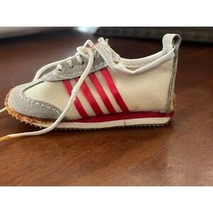 Vintage miniature, Adidas, red and white tennis shoe collector.